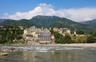 Holy Ganges river that flows through Rishikesh (the world capital of Yoga) - the holy city for the Hindus, India. copy