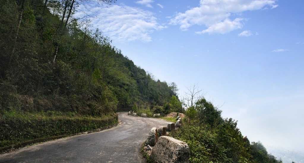 Road passing through a mountain, Darjeeling, West Bengal, India copy