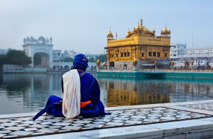 Unidentifiable Sikh Nihang warrior meditating at Seekh temple Golden Temple (Harmandir Sahib). Amritsar, India copy